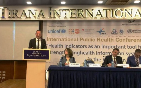 Swiss Ambassador Graf speaking about health information at the public health conference in Tirana
