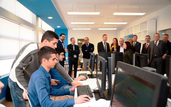 Students trying new IT equipment donated by Swiss company at vocational school 'Pavarësia' in Vlorë, Albania. 