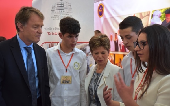 SDC Director Manuel Sager with vocational students at the Skills Fair in Tirana, Albania. 