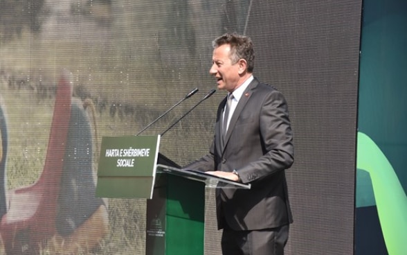 Swiss Ambassador in Albania Christoph Graf speaking at the conference on social care services.
