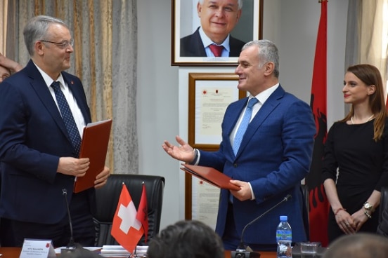 Swiss Ambassador in Albania Adrian Maître (left) after signing agreement on new assistance with the Head of Albania's Supreme State Audit Bujar Leskaj.