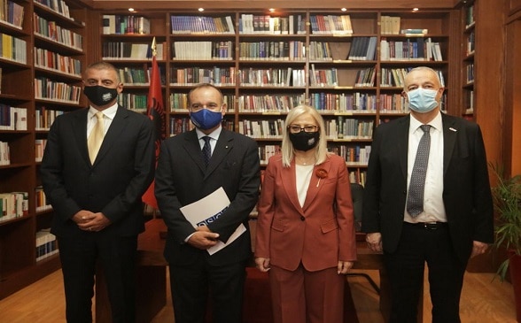 Secretary General of Albania's Parliament Genc Gjoncaj, Head of OSCE Presence in Albania Vincenzo Del Monaco, Speaker of Albania's Parliament Lindita Nikolla, and Swiss Ambassador Adrian Maître after the signature of the donation act on Virtual Desktop Infrastructure. 