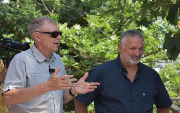 Swiss archaelogist Albert Hafner and his Albanian counterpart Adrian Anastasi presenting latest discoveries in the prehistoric site of Lin, Pogradec