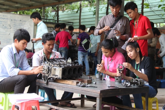 Young Cambodians attending mechanical training in Phnom Penh