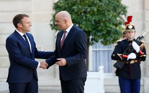 Le Président de la République française Emmanuel Macron et le Président de la Confédération Alain Berset
