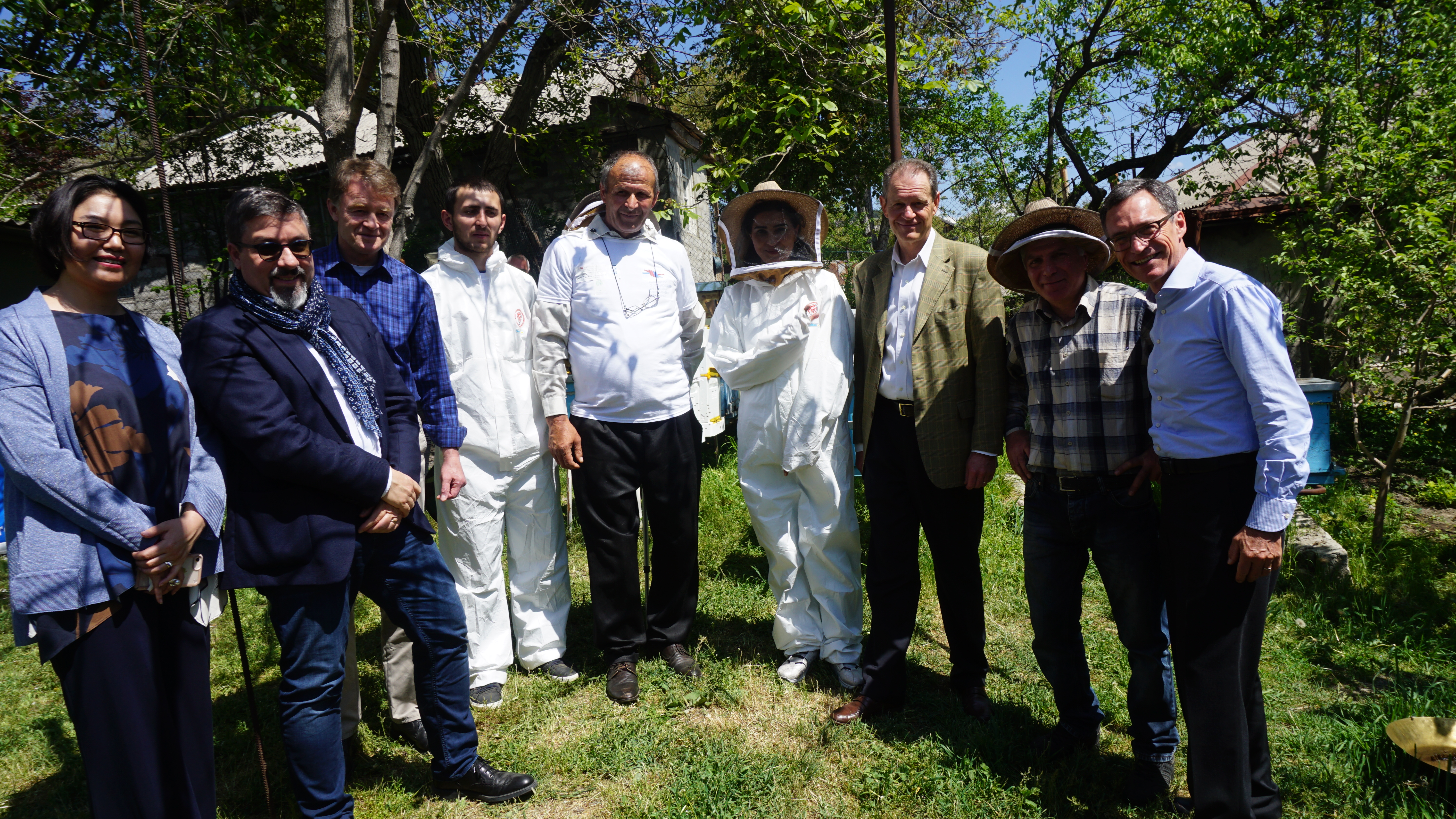 A groups photo with bee-keepers