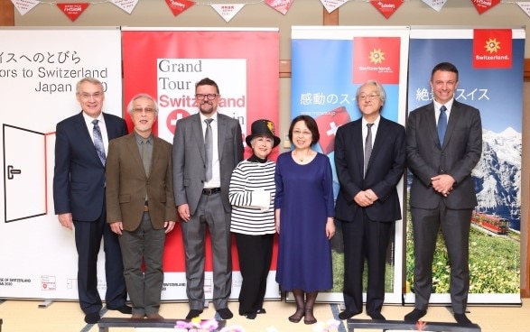 From left: Mr. Jean-François Paroz, the Ambassador of Switzerland to Japan, Mr. Yoichi Kotabe, animator and character designer / ”A father of Heidi”, Mr. Martin Michel, Director of Ballenberg open-air museum, Ms. Kazuko Sugiyama, Heidi voice actress, Ms. Terue Nakamaru, president of KIKYOUYA Co., Ltd, Mr. Shinji Nakamaru, Representative director of Heidi's Village, Mr. Fabien Clerc, Director Switzerland Tourism Japan