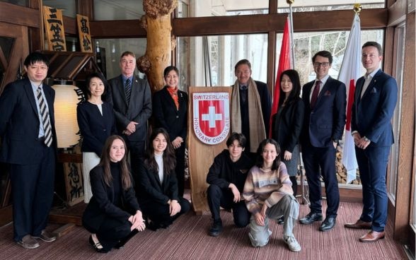 New Honorary Consul in Higashikawa (center left), Swiss Ambassador to Japan (center right) and Members of the Swiss Embassy team in Japan