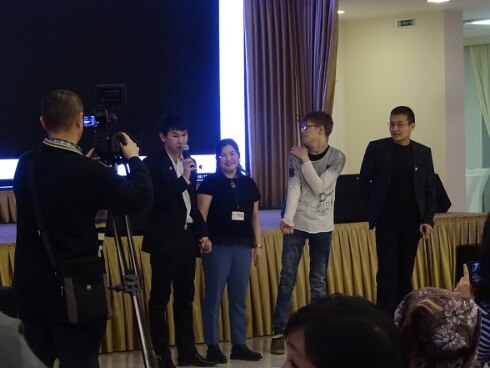 The filmmakers disucussing in front of the audience
