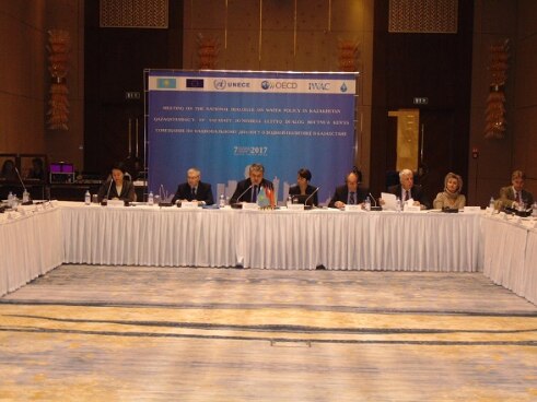 Conferencetable with speakers at opening Astana International Water Center