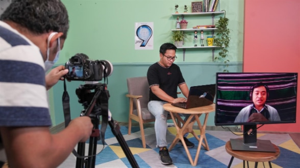 Online interview of an indigenous young man for social media content, Cambodia. 