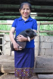 Ms. Yer Moua, a farmer from Xieng Khouang Province, Laos.