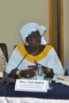 Two women and a man on a podium, taking part in a panel discussion in Senegal to develop policy measures to promote sustainability in the agriculture sector.