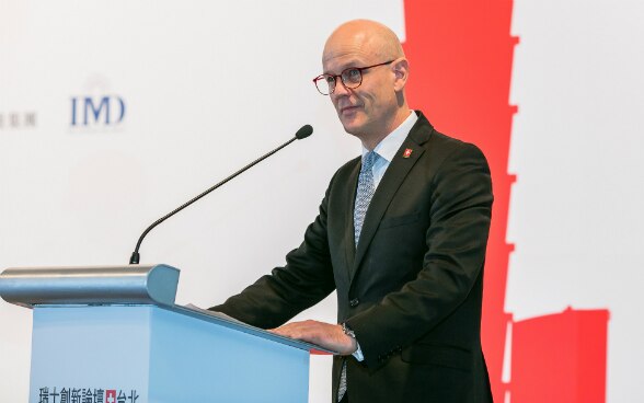 Rolf Frei, director of the Trade Office of Swiss Industries, holds the welcoming speech