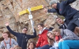 Participants of a Swiss Youth Summer Camp during a hike