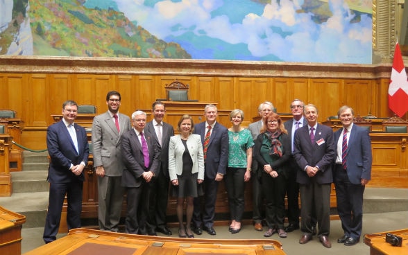 Group photo of the British delegation inside the Swiss Parliament