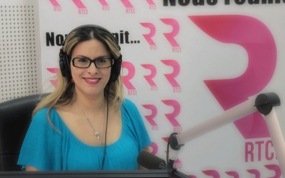 The Tunisian journalist Khadija Chouika in the radio studio of Radio Tunis Chaîne Internationale.