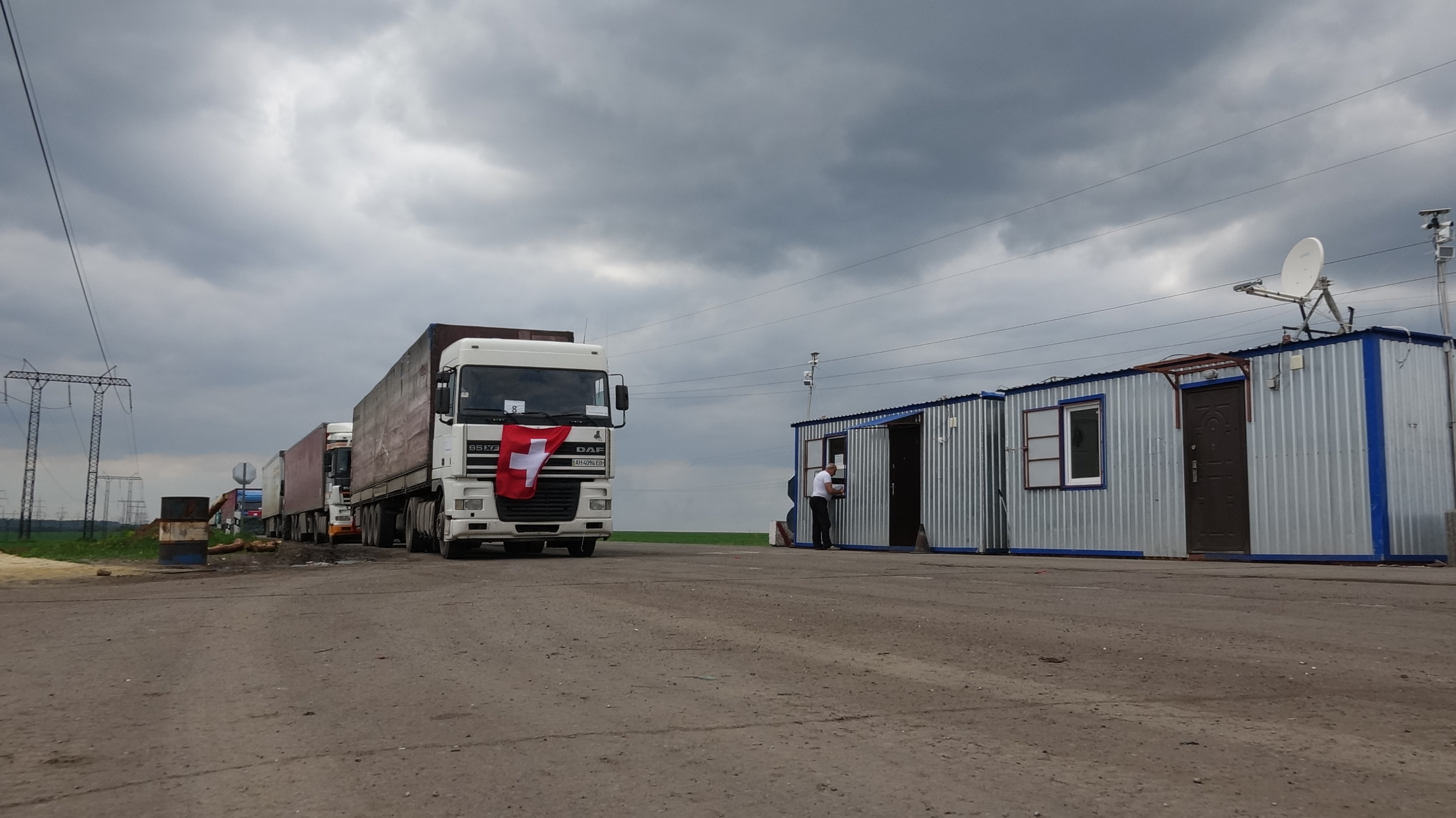 Swiss convoy to aid civilian population in eastern Ukraine reaches Donetsk. Switzerland sent a convoy carrying 300 tonnes of chemical water treatment products.