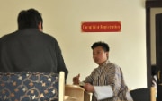 Two men in an office.