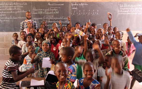 A group of children in a classroom