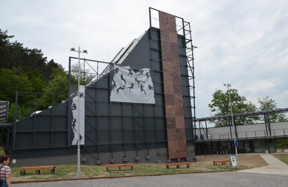  Green space surrounds the grey building that houses Hungary’s biggest climbing centre, which was built as part of the Zemplén project.