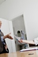 A nurse giving a prescription to a patient in a primary healthcare centre.