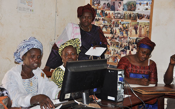 Women farmers attending an IT class