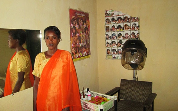 Mediatrice Nyirahabimana in a hairdressing salon