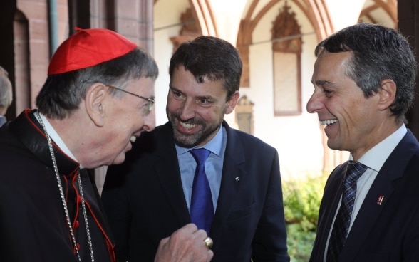 Le conseiller fédéral Ignazio Cassis rencontre le cardinal Kurt Koch et Gottfried Locher, le président de la Fédération des Églises protestantes de Suisse. 