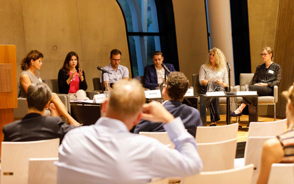 Panel members and audience at the 'Reducing Food Waste' event.