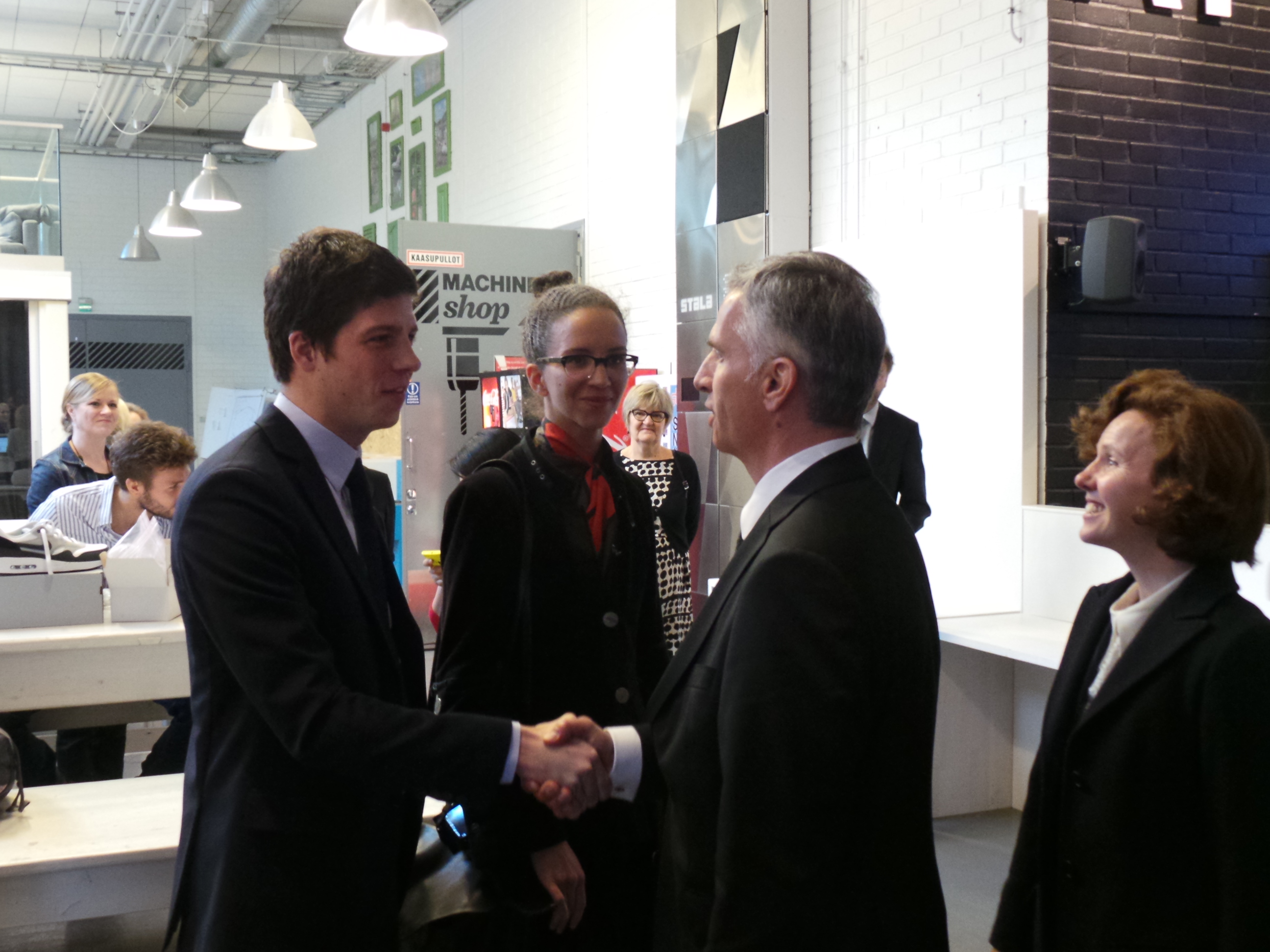 Didier Burkhalter and his wife, Friedrun Sabine Burkhalter, speak to Swiss students at Aalto University in Helsinki.