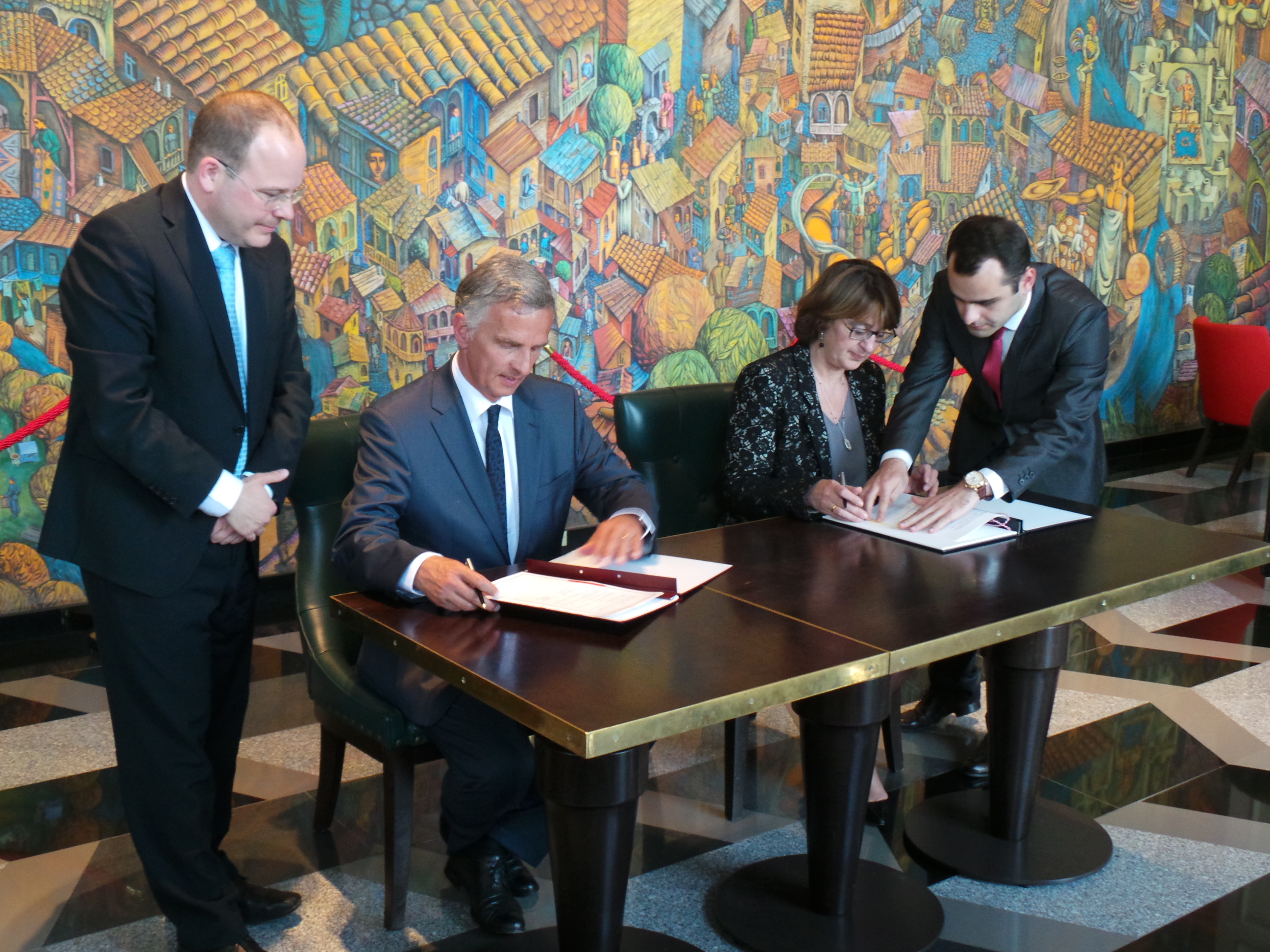 The President of the Swiss Confederation, Didier Burkhalter, and Georgian Foreign Minister Maia Panjikidze signing a Memorandum of Understanding on collaboration between the foreign ministries of Switzerland and Georgia.