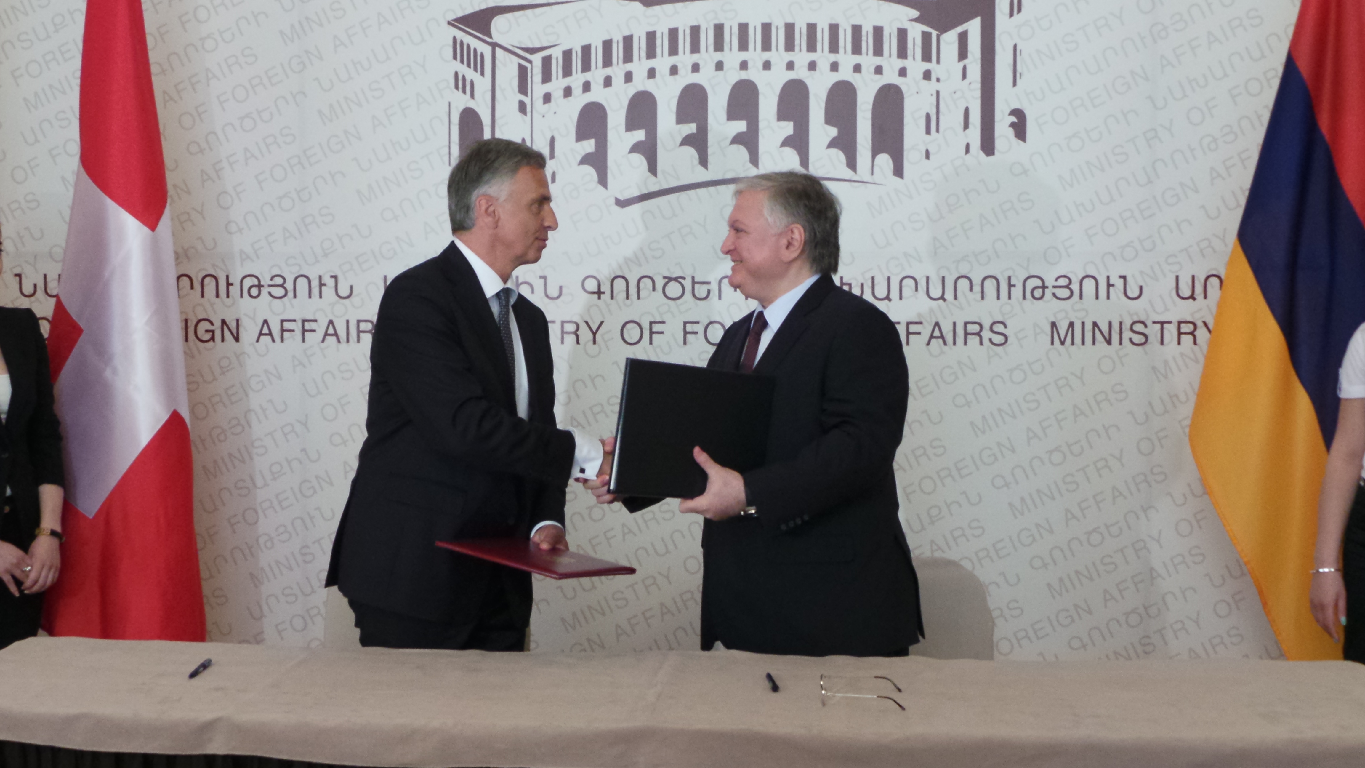 The President of the Swiss Confederation, Didier Burkhalter, and Armenian Foreign Minister Edouard Nalbandian signing a Memorandum of Understanding on collaboration between the foreign ministries of Switzerland and Armenia.