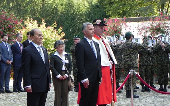 The president Thein Sein was received with military honours. 