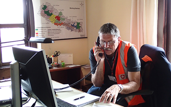 Swiss ambassador to Nepal, Urs Herren, giving a telephone interview.