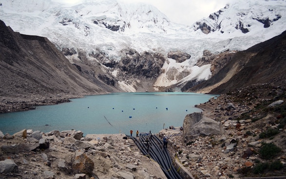  Glacial lake against mountain backdrop