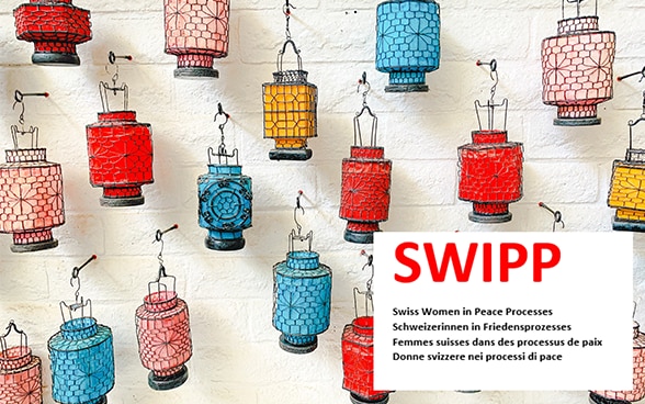 Coloured lanterns hanging on a wall and the SWiPP logo.