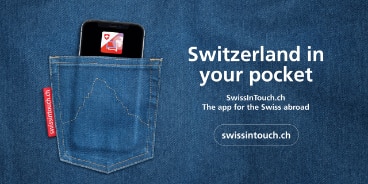 A mobile phone in a trouser pocket with a stitched outline of the Matterhorn announces the launch of the SwissInTouch application.