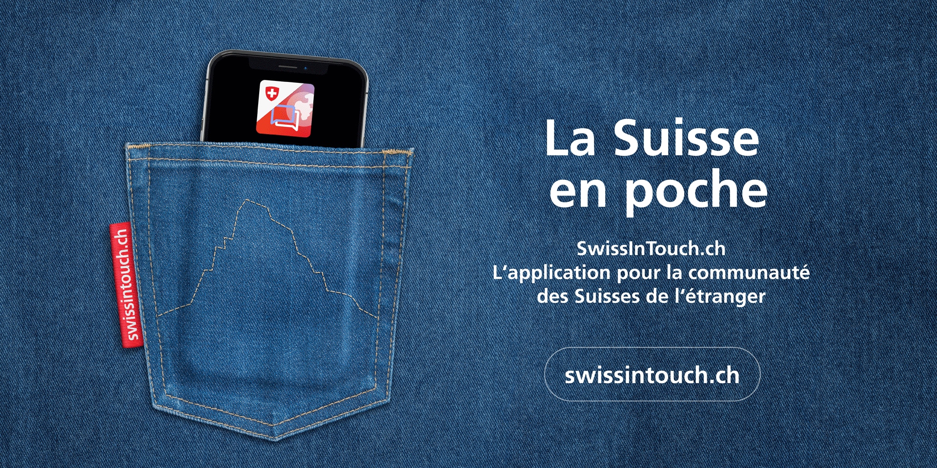 Un téléphone portable dans une poche de pantalon ornée du Cervin, annonçant le lancement de l’application SwissInTouch.