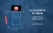 Un telefono cellulare infilato in una tasca dei pantaloni ornata con il Cervino annuncia il lancio dell’app SwissInTouch.