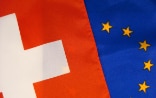 The flags of Switzerland and the EU