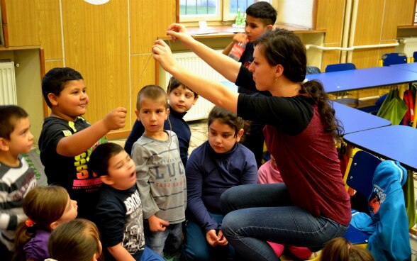 Children with their teacher in a pre-school